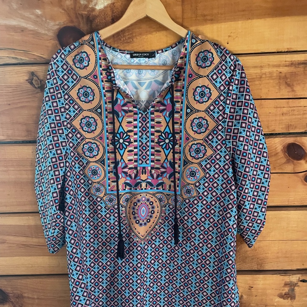 Beautiful tunic. Great weight for summer!